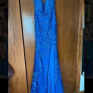 This vibrant blue dress is a Neiman Marcus design.